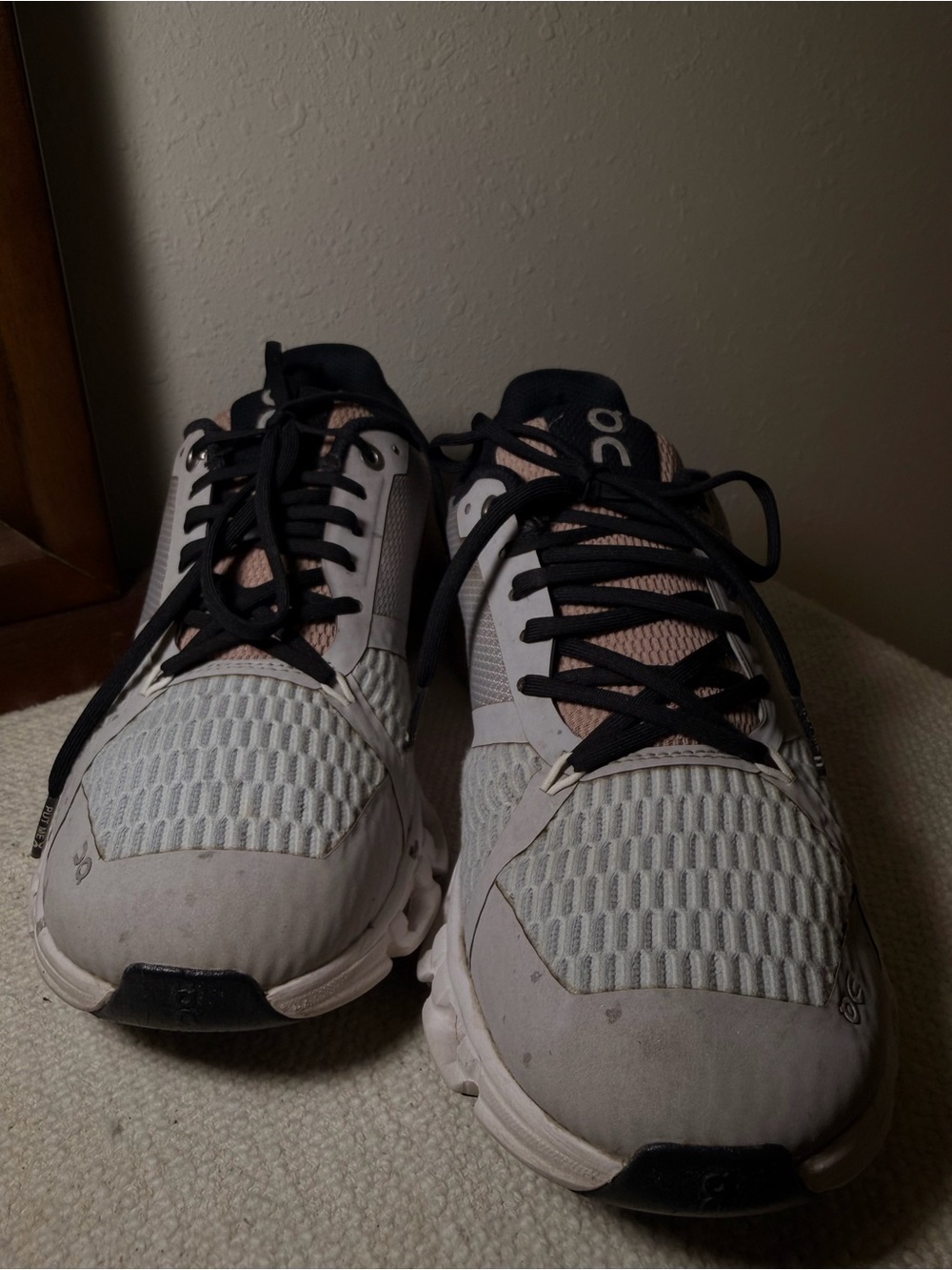 On Running Men’s Light Gray and Black Athletic Sneakers with Subtle Pink Accents